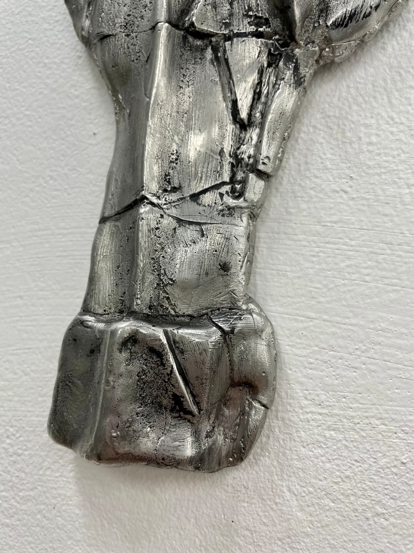 Lower section of the sand cast tin horse mask